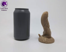 Load image into Gallery viewer, Photo of a Lust Burster insertable toy next to a soda can for scale on an off-white background