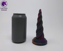 Load image into Gallery viewer, Photo of a Unicorn Horn insertable toy next to a soda can for scale on an off-white background