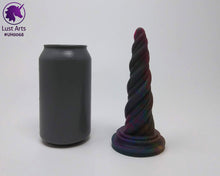 Load image into Gallery viewer, Photo of a Unicorn Horn insertable toy next to a soda can for scale on an off-white background