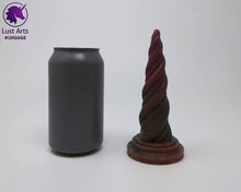 Load image into Gallery viewer, Photo of a Unicorn Horn insertable toy next to a soda can for scale on an off-white background