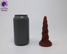 Load image into Gallery viewer, Photo of a Unicorn Horn insertable toy next to a soda can for scale on an off-white background