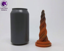 Load image into Gallery viewer, Photo of a Unicorn Horn insertable toy next to a soda can for scale on an off-white background