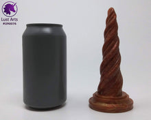 Load image into Gallery viewer, Photo of a Unicorn Horn insertable toy next to a soda can for scale on an off-white background