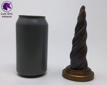 Load image into Gallery viewer, Photo of a Unicorn Horn insertable toy next to a soda can for scale on an off-white background