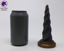 Load image into Gallery viewer, Photo of a Unicorn Horn insertable toy next to a soda can for scale on an off-white background