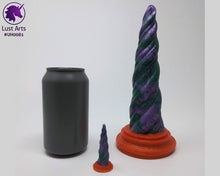 Load image into Gallery viewer, Photo of a Unicorn Horn insertable toy next to a soda can for scale on an off-white background