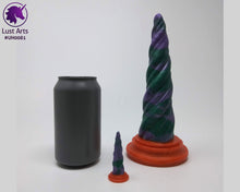 Load image into Gallery viewer, Photo of a Unicorn Horn insertable toy next to a soda can for scale on an off-white background