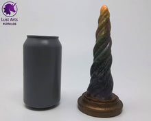 Load image into Gallery viewer, Photo of a Unicorn Horn insertable toy next to a soda can for scale on an off-white background