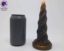 Load image into Gallery viewer, Photo of a Unicorn Horn insertable toy next to a soda can for scale on an off-white background