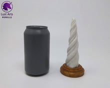 Load image into Gallery viewer, Photo of a Unicorn Horn insertable toy next to a soda can for scale on an off-white background