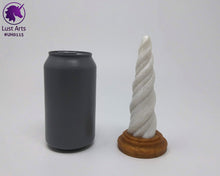 Load image into Gallery viewer, Photo of a Unicorn Horn insertable toy next to a soda can for scale on an off-white background