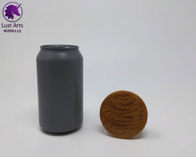 Load image into Gallery viewer, Photo of a Unicorn Horn insertable toy next to a soda can for scale on an off-white background