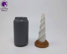 Load image into Gallery viewer, Photo of a Unicorn Horn insertable toy next to a soda can for scale on an off-white background
