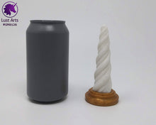 Load image into Gallery viewer, Photo of a Unicorn Horn insertable toy next to a soda can for scale on an off-white background
