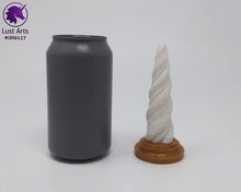 Load image into Gallery viewer, Photo of a Unicorn Horn insertable toy next to a soda can for scale on an off-white background