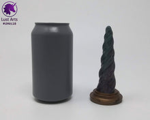 Load image into Gallery viewer, Photo of a Unicorn Horn insertable toy next to a soda can for scale on an off-white background
