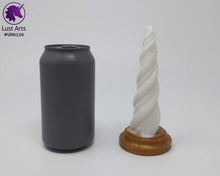 Load image into Gallery viewer, Photo of a Unicorn Horn insertable toy next to a soda can for scale on an off-white background