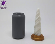 Load image into Gallery viewer, Photo of a Unicorn Horn insertable toy next to a soda can for scale on an off-white background