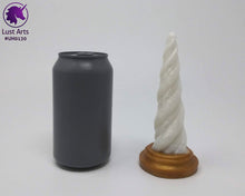 Load image into Gallery viewer, Photo of a Unicorn Horn insertable toy next to a soda can for scale on an off-white background