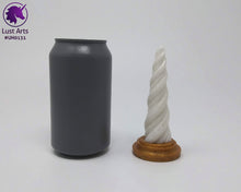 Load image into Gallery viewer, Photo of a Unicorn Horn insertable toy next to a soda can for scale on an off-white background