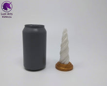 Load image into Gallery viewer, Photo of a Unicorn Horn insertable toy next to a soda can for scale on an off-white background