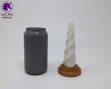 Load image into Gallery viewer, Photo of a Unicorn Horn insertable toy next to a soda can for scale on an off-white background