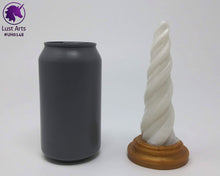 Load image into Gallery viewer, Photo of a Unicorn Horn insertable toy next to a soda can for scale on an off-white background