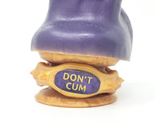 Load image into Gallery viewer, Closeup of the base of a King Noire insertable adult toy with a Double-Sided Suction Cup wrapped with an Edging Body Band with command message "DON'T CUM"