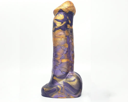 Side view photo of a King Noire insertable adult toy in Queen's Command marble color on a white background