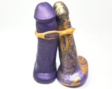 Load image into Gallery viewer, King Noire and FEMDOM collection insertable toys bound together with an Edging Body Band on a white background