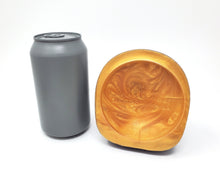 Load image into Gallery viewer, Underside view on a FEMDOM insertable suction cup base next to a soda can for scale on a white background