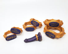 Load image into Gallery viewer, Two of each size Edging Body Bands with a FEMDOM insertable mini charm and mini band on a white background.