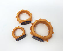 Load image into Gallery viewer, Top view photo of three Edging Body Bands, one of each size, with inlaid text "YES, KING SIR" on an off-white background.