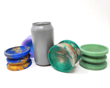Load image into Gallery viewer, Four different colors of Epic/Epic size Double-Sided Suction Cups next to a soda can for scale
