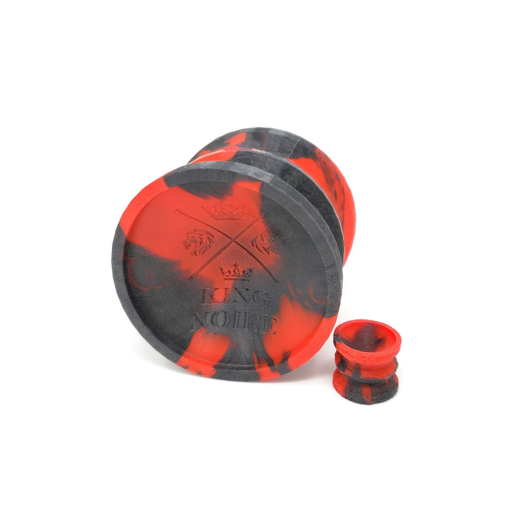 Double-Sided Suction Cup with King Noire's logo on this side in 2 color marble of Gloss Red and Sparkling Black, with a mini version, on a white background