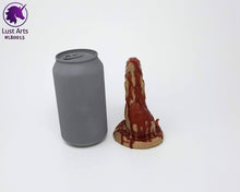 Load image into Gallery viewer, Photo of a small Lust Burster insertable toy next to a soda can for scale on a white background

