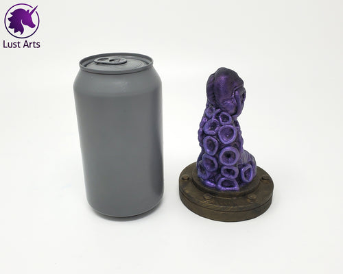 Preview photo rotating around a pre-made Tentacle adult toy next to a standard size soda can for scale