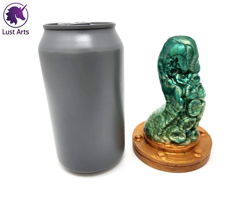 Preview photo rotating around a pre-made Tentacle adult toy next to a standard size soda can for scale