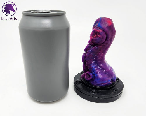 Preview photo rotating around a pre-made Tentacle adult toy next to a standard size soda can for scale