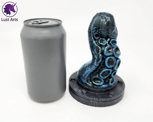 Preview photo rotating around a pre-made Tentacle adult toy next to a standard size soda can for scale