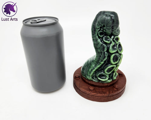 Preview photo rotating around a pre-made Tentacle adult toy next to a standard size soda can for scale