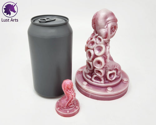 Preview photo of a pre-made Tentacle adult toy next to a mini version and a standard size soda can for scale