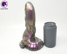 Load image into Gallery viewer, A Lust Burster insertable sits next to a soda can on a white background.

