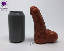 Load image into Gallery viewer, A Frank&#39;s Monster insertable sits next to a soda can on a white background.
