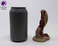 Load image into Gallery viewer, Photo of a Lust Burster insertable toy next to a soda can for scale on an off-white background

