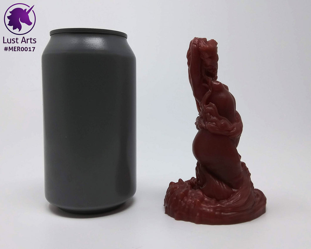 Preview photo rotating around a pre-made Mermaid adult toy next to a standard size soda can for scale