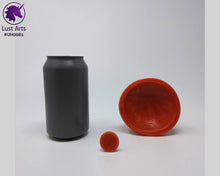 Load image into Gallery viewer, Photo of the underside of a Unicorn Horn insertable toy next to a soda can for scale on an off-white background
