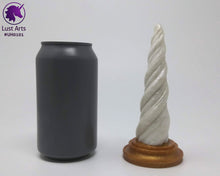 Load image into Gallery viewer, Photo of a Unicorn Horn insertable toy next to a soda can for scale on an off-white background
