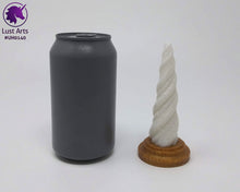 Load image into Gallery viewer, Photo of a Unicorn Horn insertable toy next to a soda can for scale on an off-white background

