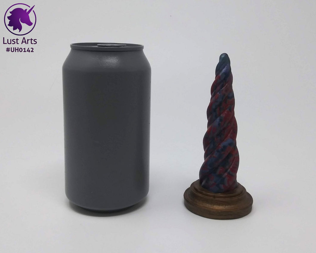 Preview photo of pre-made toy next to a standard size soda can for scale